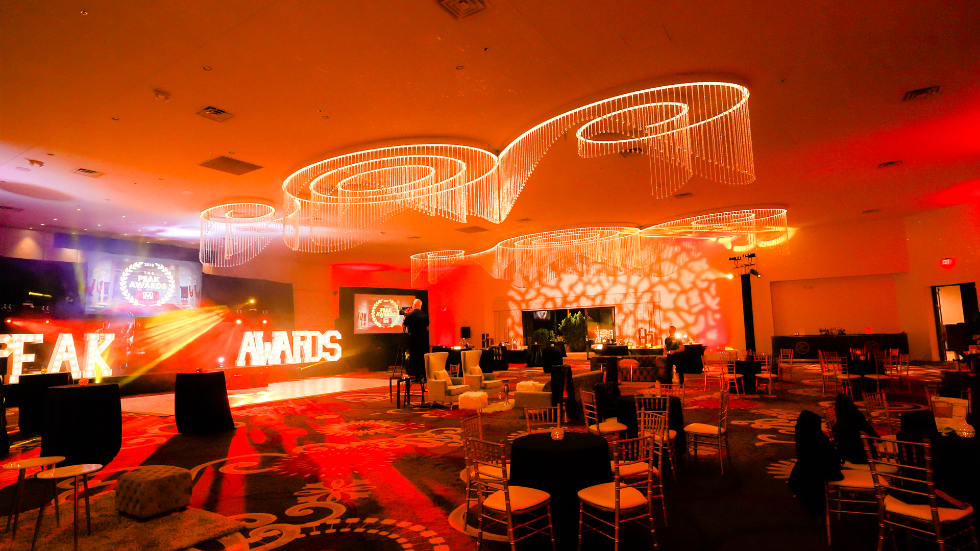 The bright, warm lighting of the Peak Awards