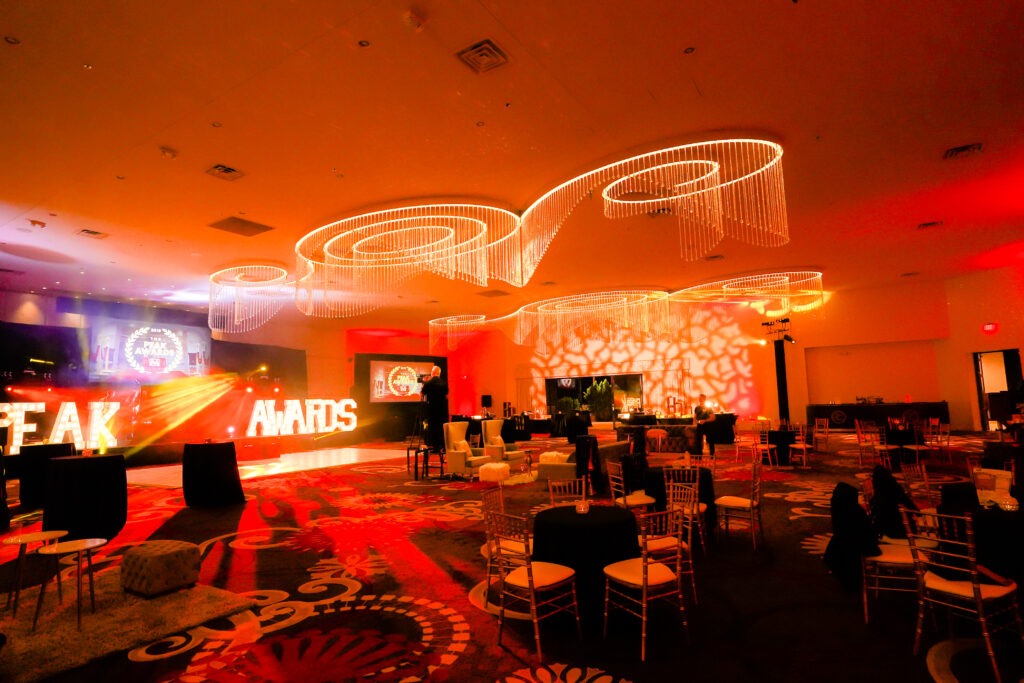 The bright, warm lighting of the Peak Awards